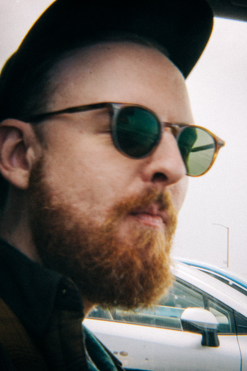 a man with a beard and sunglasses